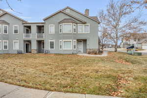 View of front of home with a front yard