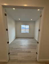 Spare room featuring light hardwood / wood-style floors