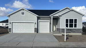 View of front facade with a garage