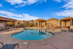 View of swimming pool with a patio area