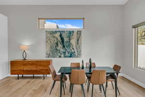 Dining space featuring light wood-type flooring