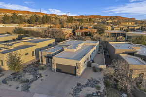 Birds eye view of property featuring a mountain view