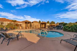 View of swimming pool featuring a gazebo and a patio area