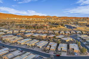 Aerial perspective of suburban area with a mountain backdrop