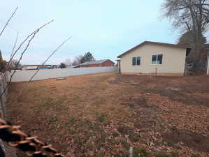 View of backyard and back of detached garage