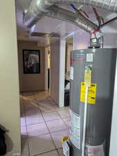 Utility room featuring  newwater heater