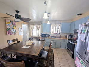 Tiled kitchen & dining area