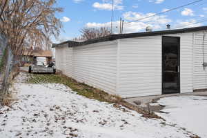 View of snow covered property