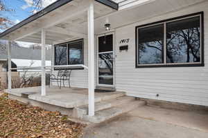 Property entrance featuring a porch