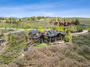 View of subject property with mountains