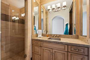 Bathroom featuring vanity and walk in shower