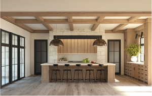 Kitchen featuring coffered ceiling, a kitchen breakfast bar, light brown cabinetry, and light hardwood / wood-style flooring