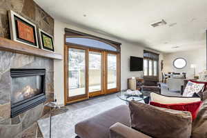 Living room featuring hardwood / wood-style floors and a fireplace