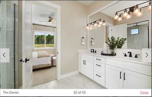 Bathroom with vanity and ceiling fan