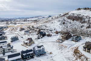 Snowy aerial view with a mountain view