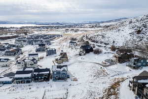 Snowy aerial view with a mountain view