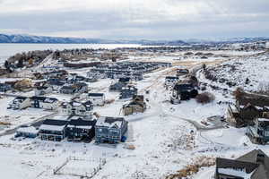 Snowy aerial view with a mountain view