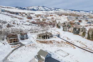 Snowy aerial view with a mountain view