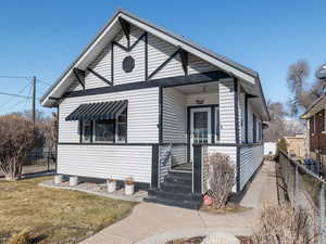 View of front of house with a front lawn