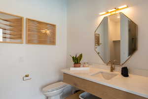 Bathroom with sink and toilet