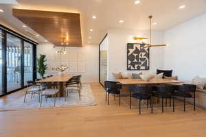 Dining room with light hardwood / wood-style floors