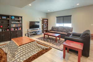 Living room featuring light hardwood / wood-style flooring