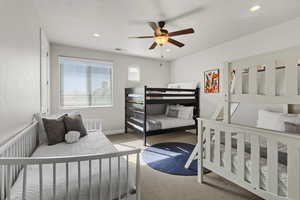 Bedroom featuring carpet flooring, recessed lighting, and a ceiling fan
