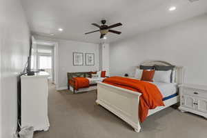 Bedroom with carpet, recessed lighting, and a ceiling fan