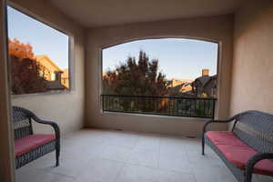 View of balcony at dusk