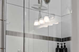 Bathroom view of a tile shower