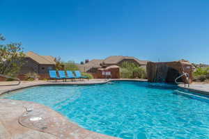 View of pool with pool water feature