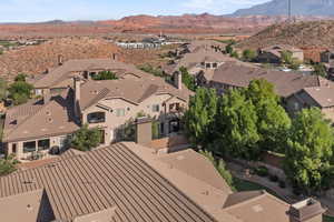Aerial view of residential area with a mountain backdrop