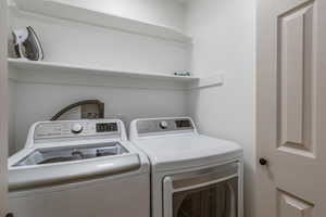 Laundry area featuring washer and clothes dryer