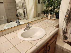 Bathroom with vanity and toilet