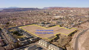 Birds eye view of property featuring a mountain view