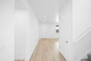 Hall featuring light hardwood / wood-style floors