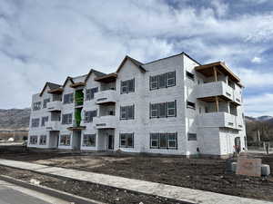 View of building exterior with a mountain view