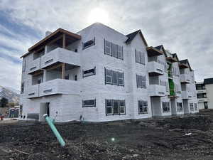 View of building exterior with a mountain view