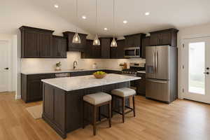 Kitchen with a sink, decorative backsplash, dark brown cabinetry, and stainless steel appliances
