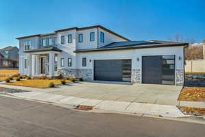 View of front of home with a garage