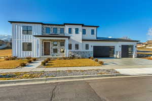 View of front of home with a garage