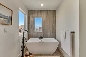 Bathroom with a washtub