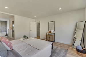 Bedroom featuring light hardwood / wood-style floors