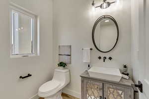 Bathroom with vanity and toilet