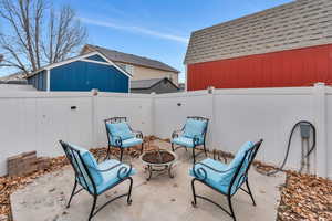 View of patio / terrace with an outdoor fire pit