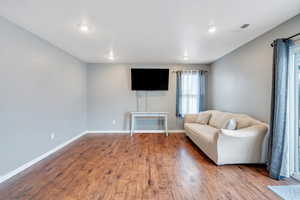 Great room featuring hardwood / wood-style flooring