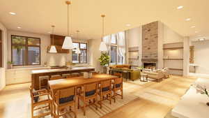 Dining area featuring built in shelves, light hardwood / wood-style floors, and a large fireplace