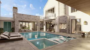 Rear view of property featuring a fireplace, a patio, and a balcony