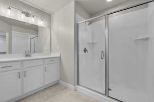 Bathroom with vanity and walk in shower