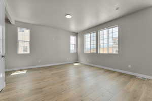 Empty room with light wood-type flooring